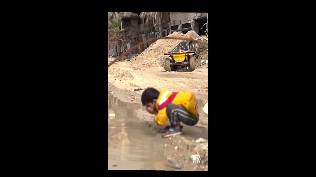 7 year old boy drinking dirty mud water from thirst plus having to eat grass for dinner in GAZA!