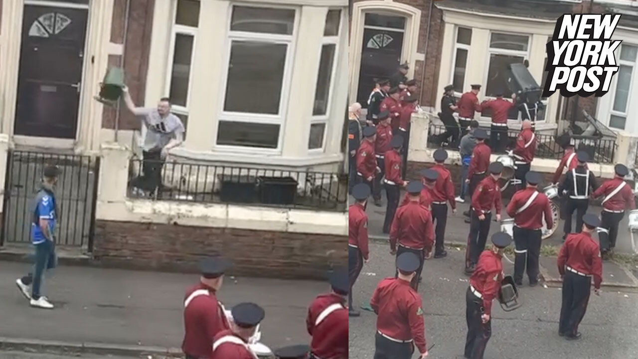 Hilarious video shows marching band fight back after someone throws a garbage can at them