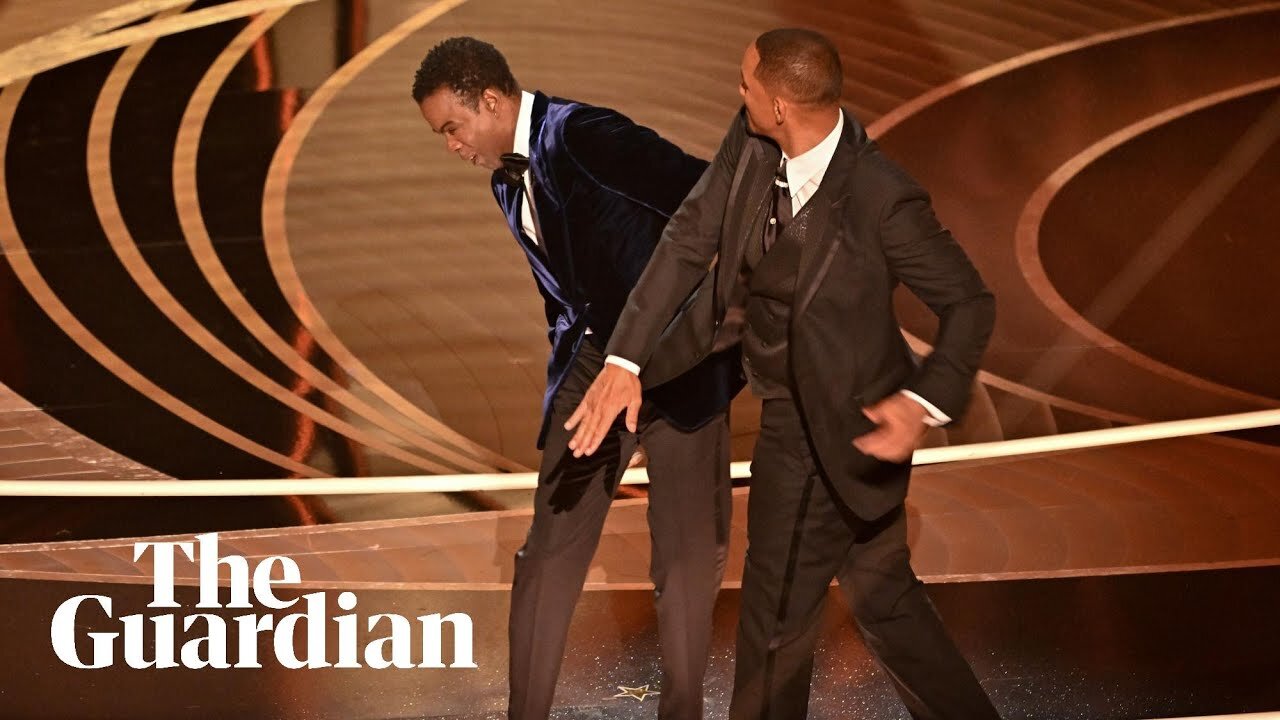 Watch the uncensored moment Will Smith smacks Chris Rock on stage at the Oscars, drops F-bomb