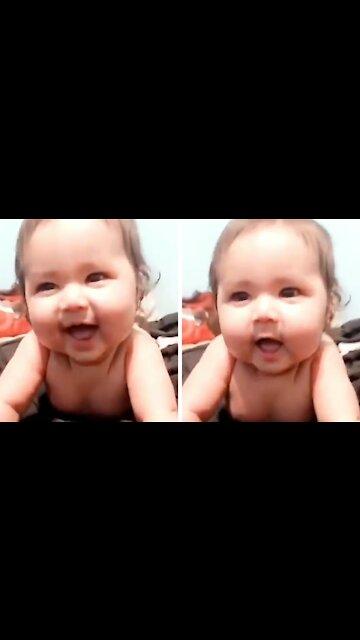 Mommy playing with her baby pretending she's sneezing, and the baby just laughs