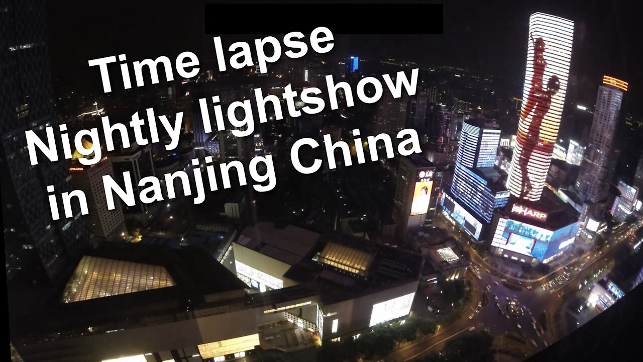 Time lapse - Nightly lightshow in Nanjing China from Jinling Hotel Asia Pacific Tower