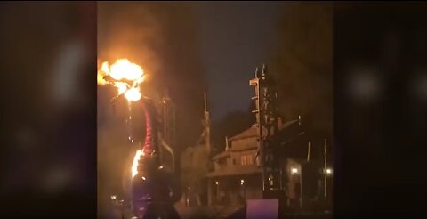 Twitter showing an animatronic dragon catching fire during a show at Disneyland in Anaheim.