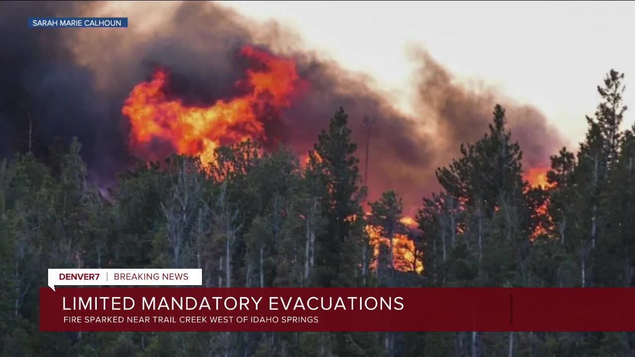 Limited evacuations are underway due to a fire burning near Idaho Springs