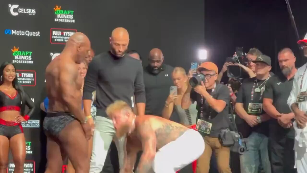 Mike Tyson slaps Jake Paul at their weigh-in for their fight on Netflix