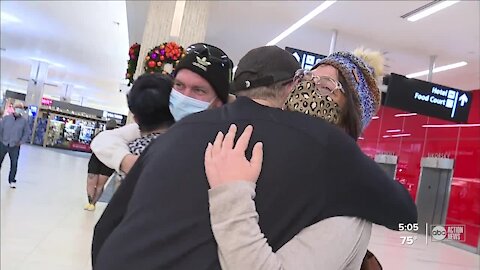 Memories are made as planes land on Thanksgiving at Tampa International Airport