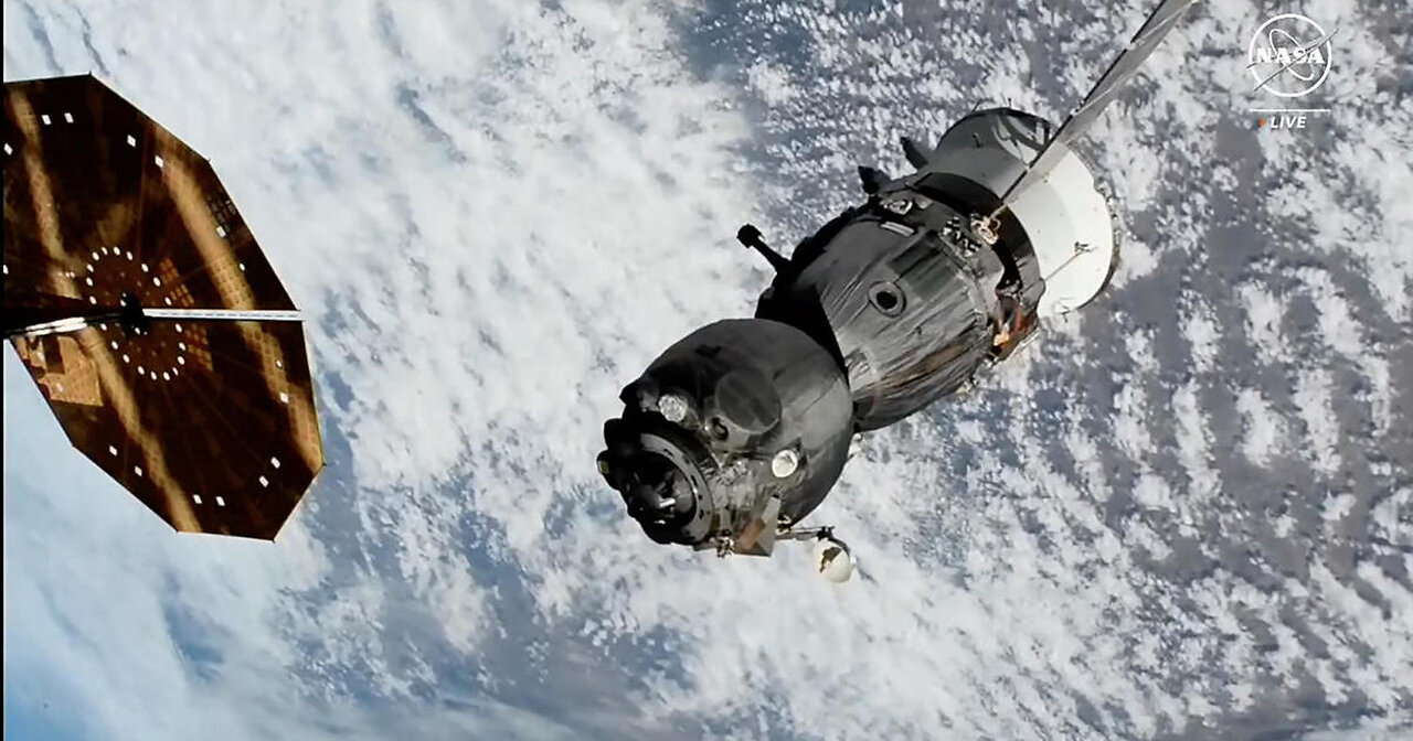 Soyuz space capsule bringing 3 Space Station crew members back to Earth