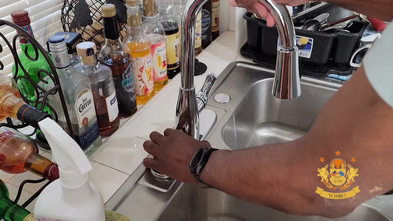 Yombo installing a Glacier Bay McKenna single-Handle pull down sprayer Kitchen Faucet