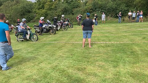 Slow Motorcycle Racing. Bike Falls Over