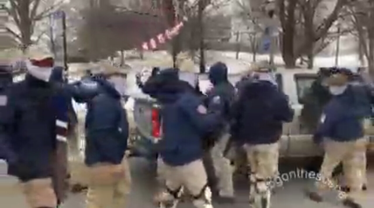 Patriots or Feds? Local Cops would be impeding their rally for taped over license plates if Patriots, instead of escorting them throughout Chicago