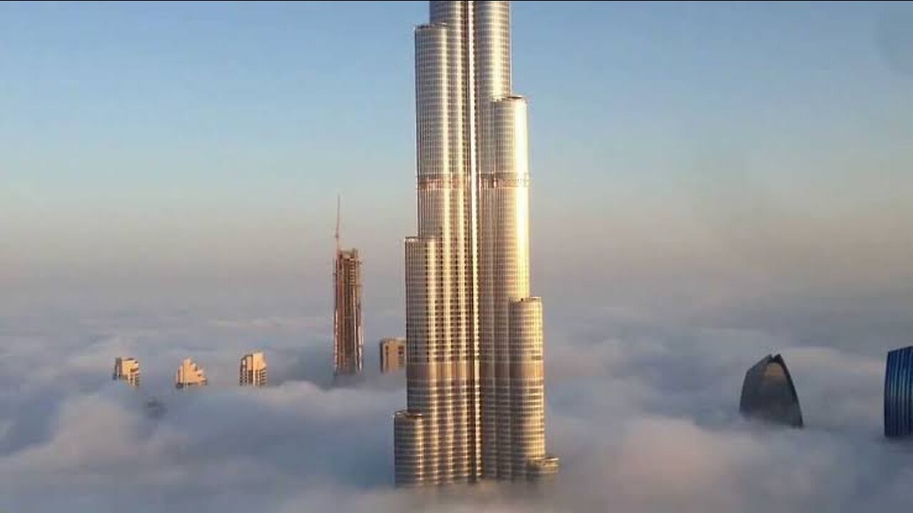 Burj Khalifa and Dubai Downtown are raising from the fog