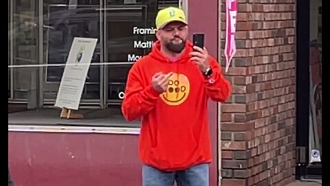 Drag Queen Story Hour - mayor flipping off protesters - Waterville, Maine, June 3, 2023