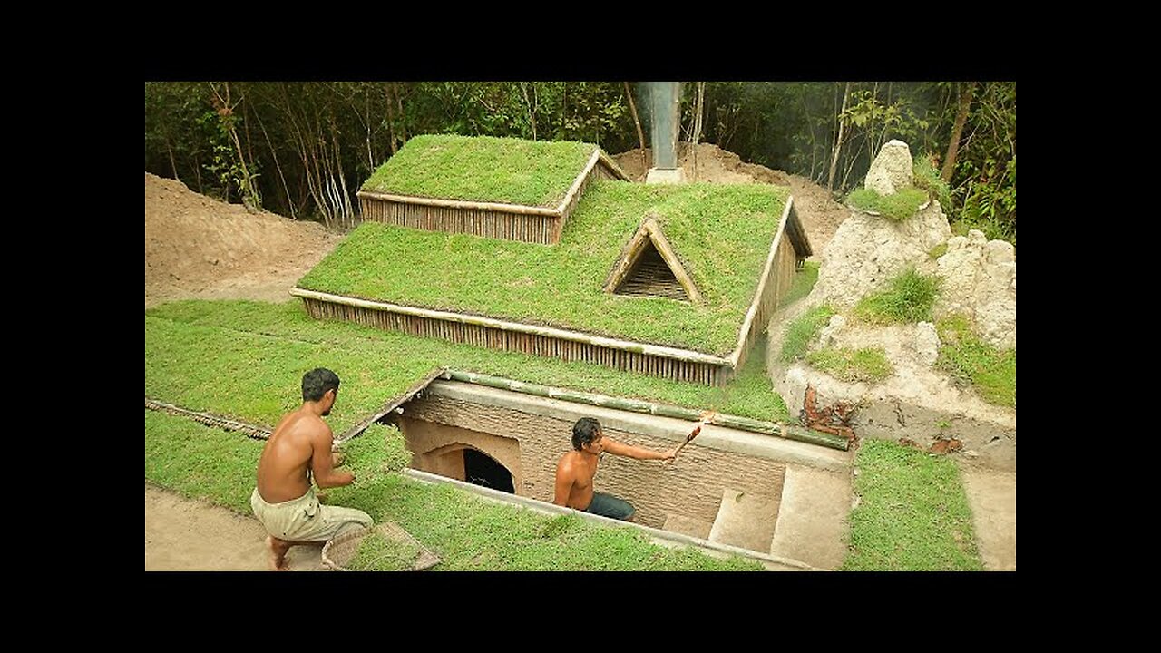 Building underground hut with grass roof & fireplace with clay