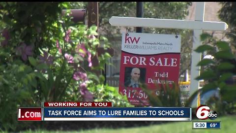 Lawrence task force aims to lure families to schools