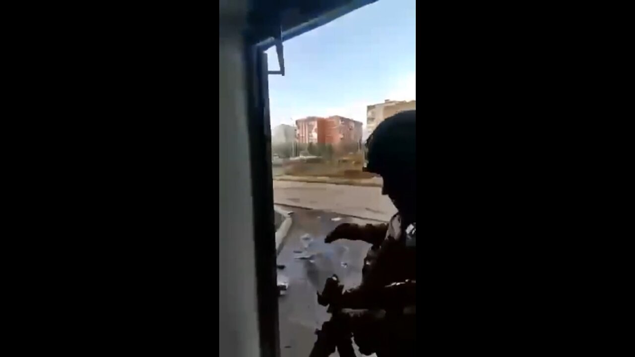 Missile falls in front of a camerman without exploding