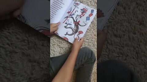 Angelo reading "The Cat in the Hat"