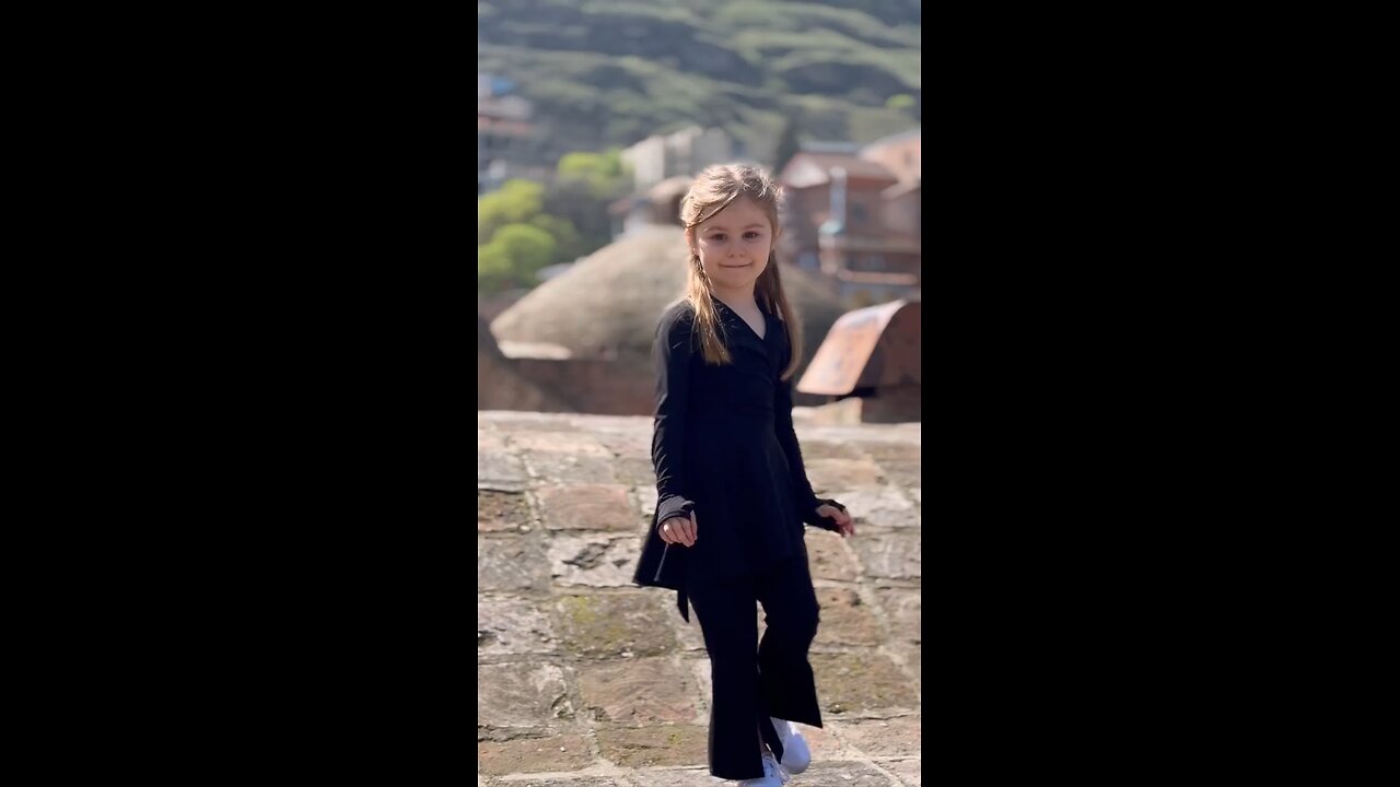 little cute performing a Caucasian dance, Georgia.