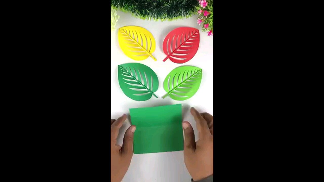 The bouquet is being made through the leaves.