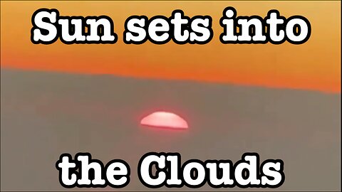 Sun sets into Clouds as seen from an airplane