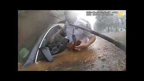 Officer and AFRD Captain Save Citizen Trapped During Floods