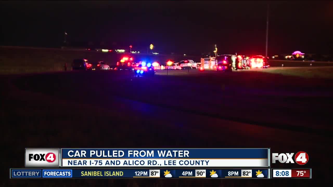 Driver injured after truck overturns into pond at I-75 on-ramp