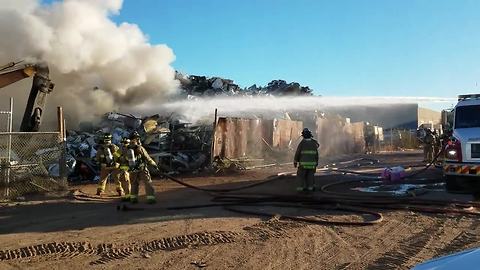 Crews puts out metal recycling plant blaze