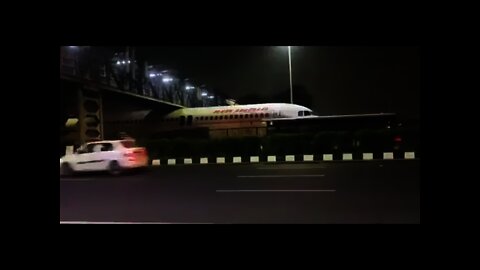 Air India plane gets stuck under bridge near Delhi airport