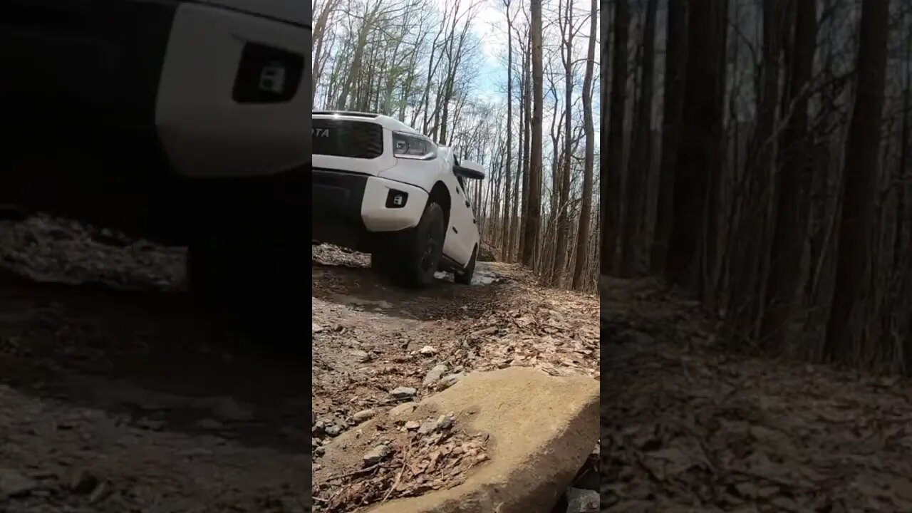 Toyota Tundra TRD Pro truck camper exploring off road