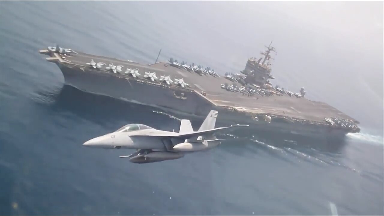 F/A-18E Maneuvers Around the Carrier