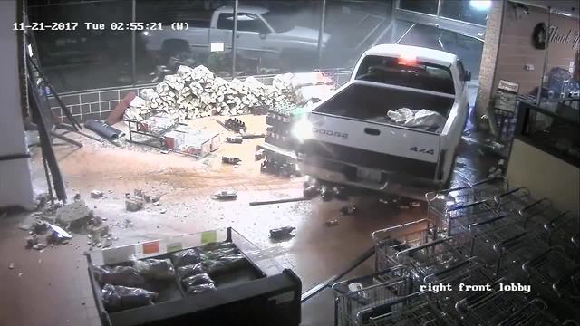 WATCH | Truck plows through grocery store twice, suspects steal ATM