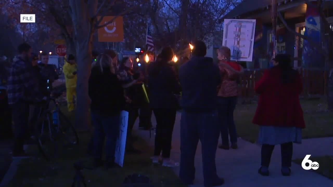 Protesters gather outside lawmaker's home after introduction of anti-picketing bill