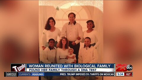 Woman reunites with biological family