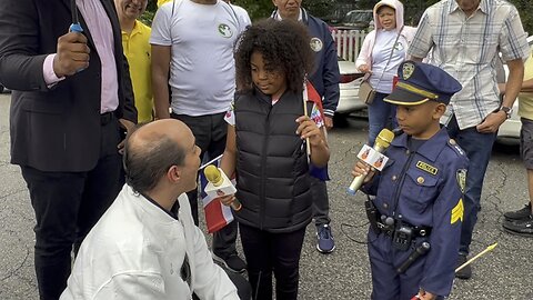 RAMFIS DOMINGUEZ TRUJILLO ES INTREVISTADO POR DOS NIÑOS HERMANITOS EN EL DESFILE DOMINICANO new jer