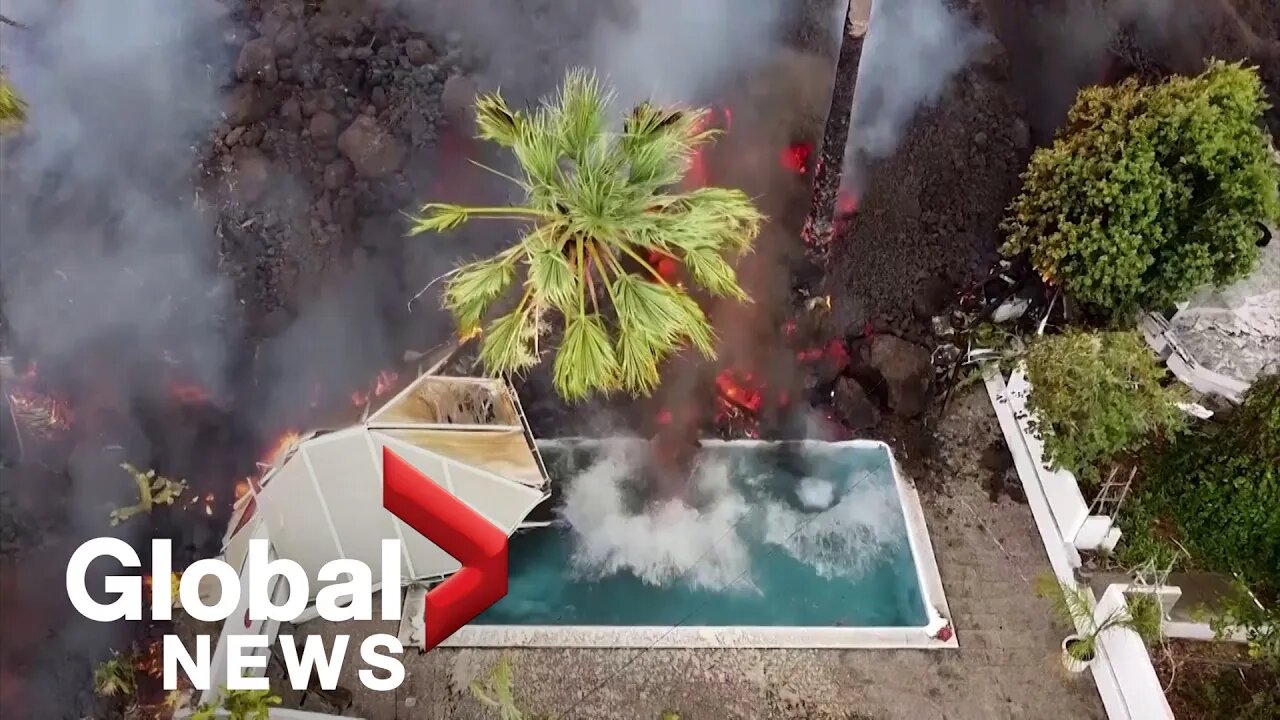 La Palma Volcano: Drone Video Shows Black Lava Swallowing Pool, Homes On It's Way To Coast