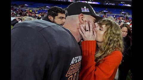 Taylor Swift kisses Kansas City Chiefs tight end Travis Kelce