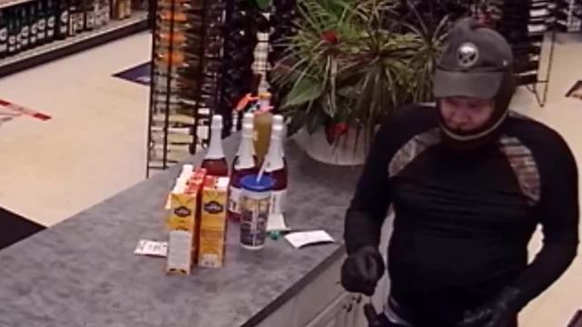 Evans Police search for armed robbery suspect