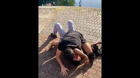 Muhammad Mokaev grapples with random dude on Salford Quays