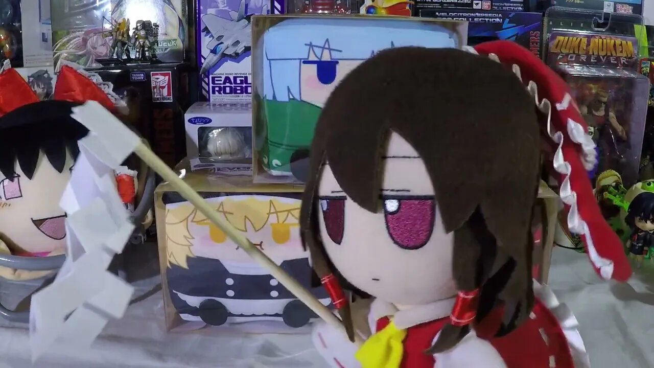 Reimu fumo shoos away creatures