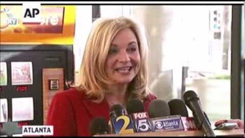 Georgia woman claims half of $648 million Mega Millions jackpot