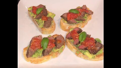 Steak Crostini w/ Fresh Guacamole & Tomato/Garlic Reduction