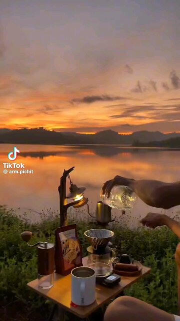 Morning Bliss" A breathtaking sunrise illuminating the sky with hues of pink, orange, and yellow,