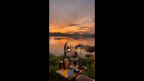 Morning Bliss" A breathtaking sunrise illuminating the sky with hues of pink, orange, and yellow,