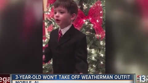 Little boy just wants to be a weatherman