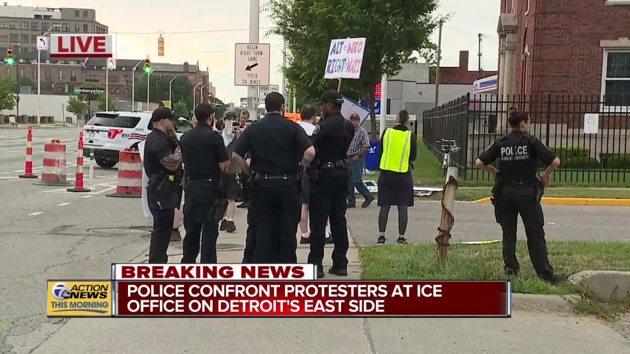 Police confront protesters at ICE office in Detroit