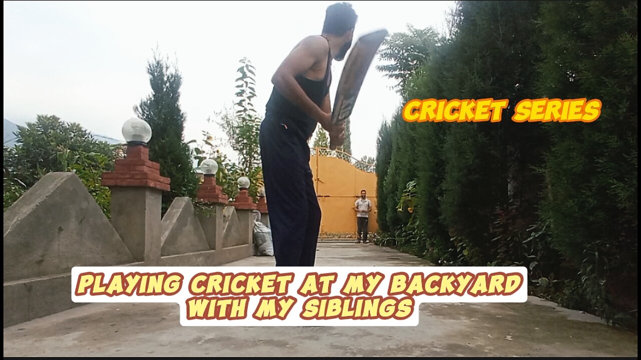 Playing backyard cricket with my siblings..