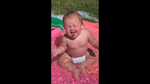 The little baby is having fun with the water - Baby Vs Water Like milk and biscuits