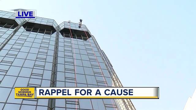 Rappeling skyrise in downtown Tampa for good cause