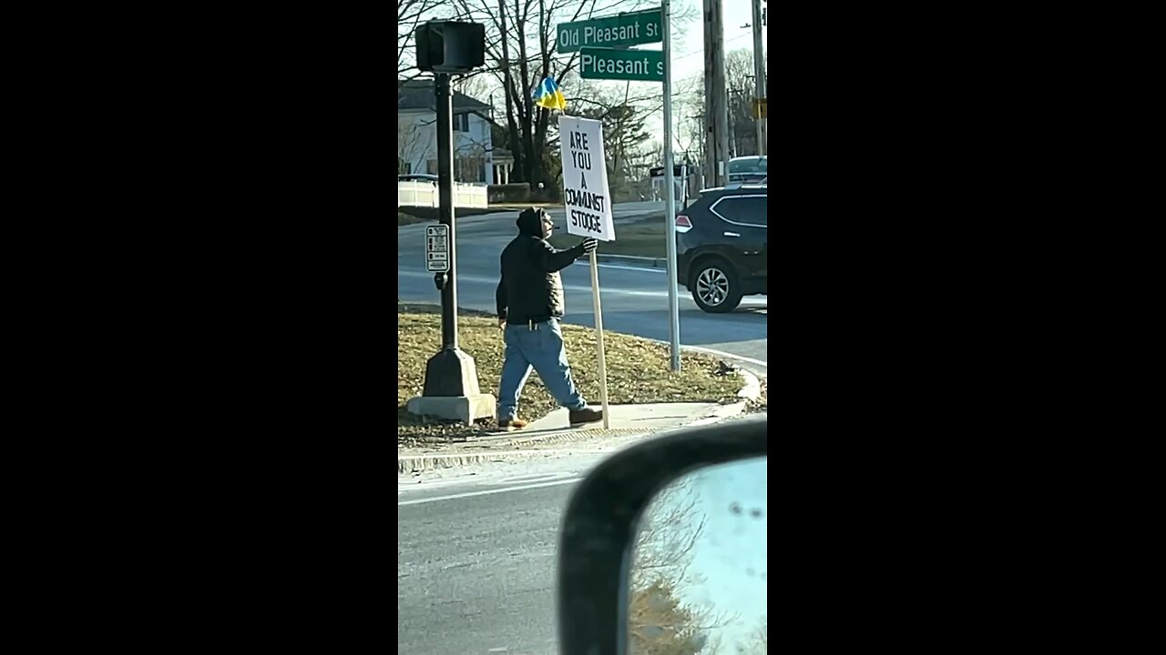 Guy at Stoplight Shares Opinion of Vladimir Putin on Sign