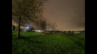 Camera and light test before a night log next to a river