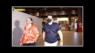 Govinda With Wife Sunita Snapped At The Airport As They Returned From Kolkata