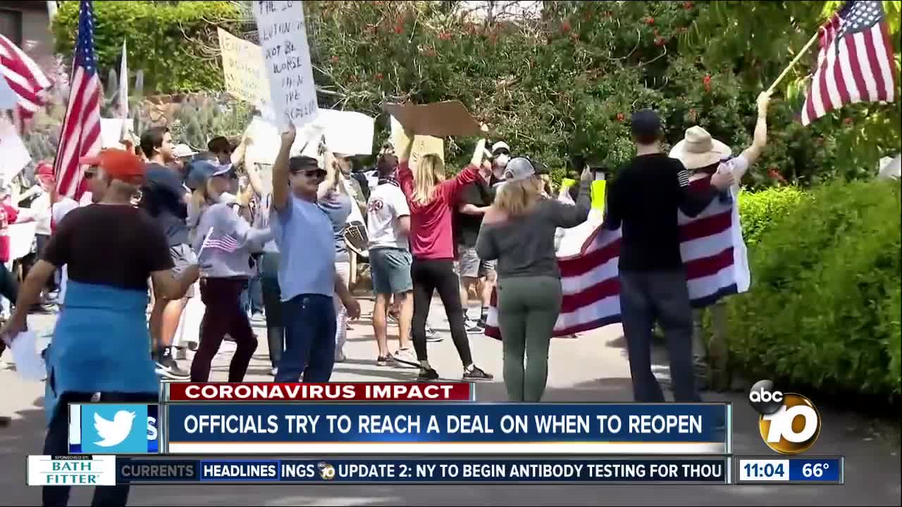 Officials try to reach a deal on when to reopen